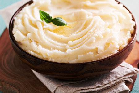 Mashed potatoes in a big wooden bowlの写真素材
