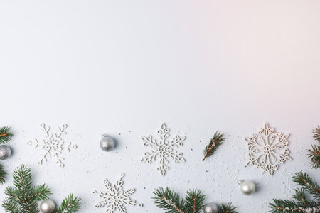 Christmas grey minimal background with snowflakes. Flat lay, copy spaceの写真素材