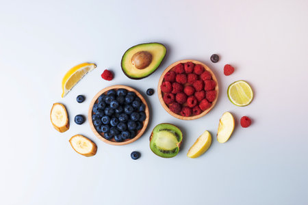 Fresh fruits and vegetables on grey background. Healthy eating concept. Flat lay, composition.