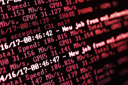 Macro snapshot of the program interface for crypto currency mining on the monitor of an office...