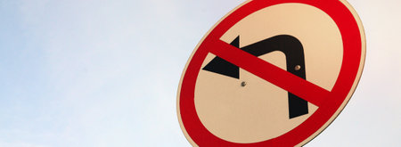 Turn left is prohibited. Traffic sign with crossed out arrow to the leftの写真素材