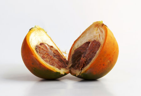 Ripe areca nuts or betel nuts on white background, Betel or betel nut is the fruit of the Areca catechu palm treeの写真素材