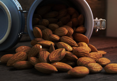 Raw Organic almonds on rustic wood table.Top view.の写真素材