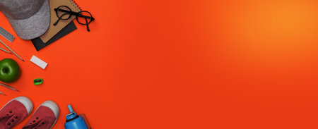 Creative flatlay of education orange table with cap, student books, shoes, colorful pencil, eye glasses, empty space in studio shot isolated on orange long banner background, Concept of education and back to schooの写真素材