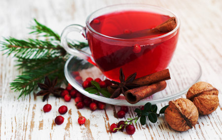 Hot winter drink with cranberries and cinnamonの写真素材