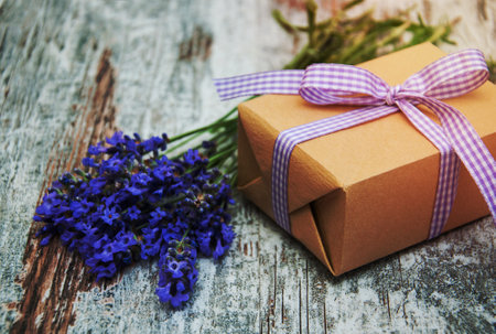 Lavender and gift box on a old wooden backgroundの写真素材