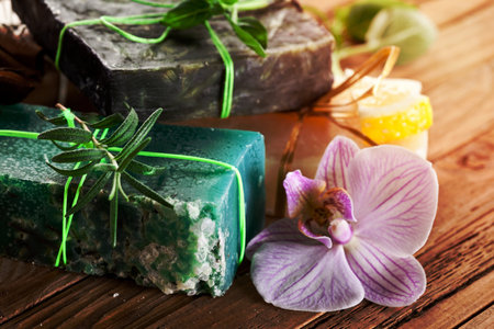 Pieces of natural soap with herbs.の写真素材