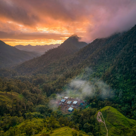 Smoke from breakfast at Sunrise in Base Camp in Indonesian Jungleの素材