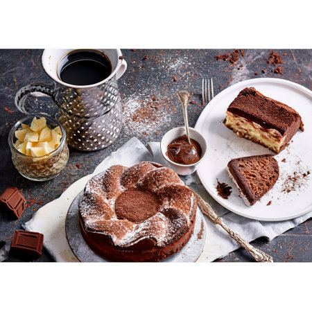 A top-down view of a delightful spread featuring chocolate cake and tiramisuの素材