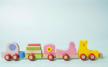 Kids wooden toys on pastels color background. Copy spaceの素材