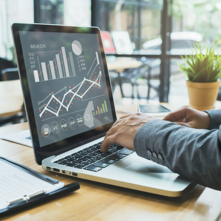 Businessman uses laptop computer for analysis growth graph chart of corporate businessの素材