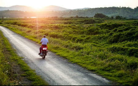 Transport concept with man driving motorbikeの素材