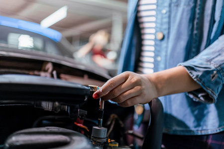 Woman looking at her car to solve a problemの素材