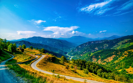 Landscape road paved road Rural Roadside View Mountainの素材