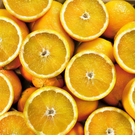 Be cut to remove the orange juice to drink and eat and be healthy.の素材