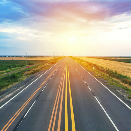 highway road , transportation roadtrip concept. on asphalt expressway with sunrise skyの素材