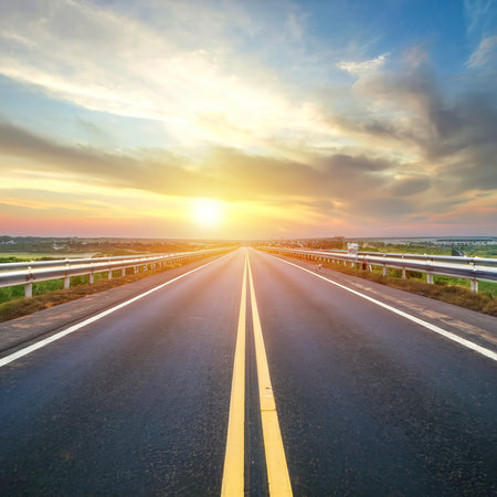 highway road , transportation roadtrip concept. on asphalt expressway with sunrise skyの素材
