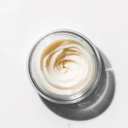 Jar of face cream isolated on white background top viewの素材