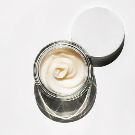 Jar of face cream isolated on white background top viewの素材