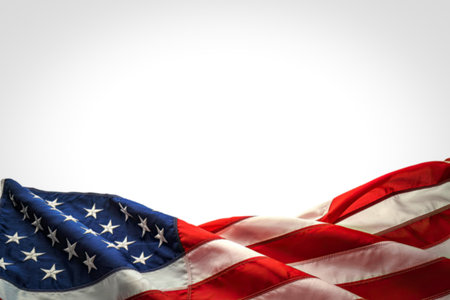 An image of the American flag waving in the wind, displaying its iconic stars and stripes.