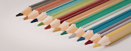 A close-up of a row of colored pencils with their tips pointing towards the viewer, showcasing a...