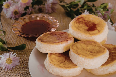 Delicious pancakes on a plate with syrup