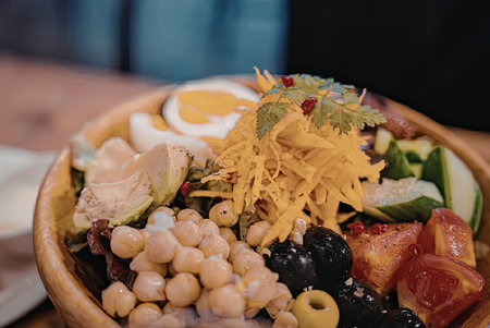 Fresh and healthy bowl with assorted vegetables and chickpeas