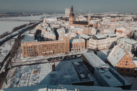 Snowy cityscape with historic buildings and frozen river