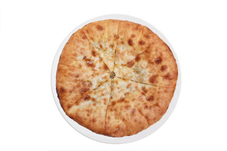 A mouth-watering image of a cheese pizza, sliced and ready to be served.の写真素材