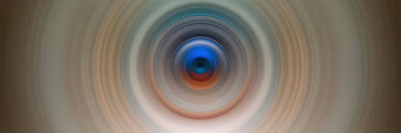 An abstract image featuring a swirling vortex with a blue center and concentric circles of various...