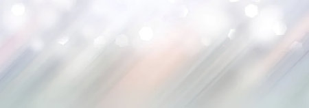 Blurry light background with shades of white, gray, and pink