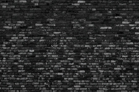 A dark brick wall with grey bricks