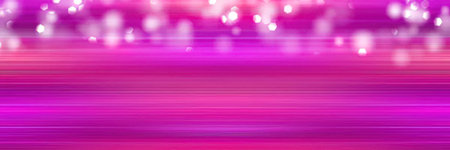 A vibrant pink background with glowing lights and sparklesの写真素材