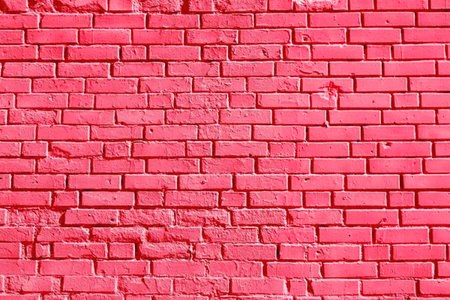 A close-up view of a red brick wall with a white backgroundの写真素材