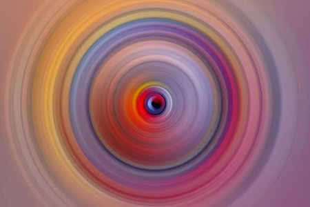 A mesmerizing abstract image featuring concentric circles in a variety of colors, creating a dynamic and eye-catching visual effect.の写真素材