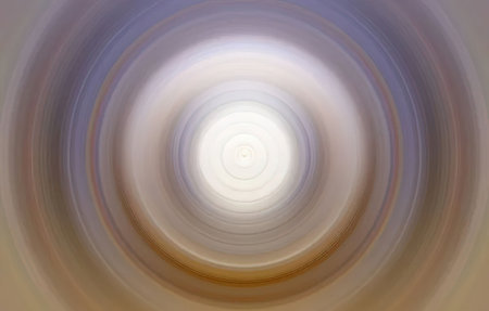 Soft pastel colors swirl in a circular pattern creating a mesmerizing abstract spiral design with a...