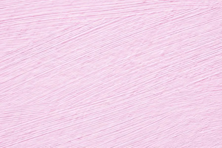 Soft pink pastel background features diagonal lines and subtle wood grain pattern creating a...