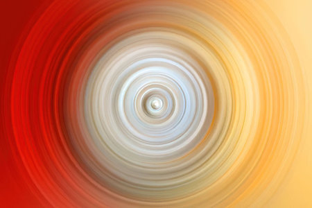 Vibrant abstract spiral design featuring concentric circles in shades of red orange and white...