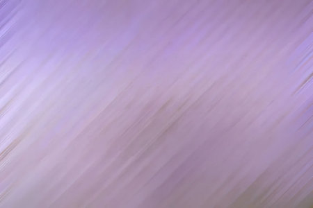 Soft abstract blurred purple background with smooth diagonal lines and pastel color gradient...