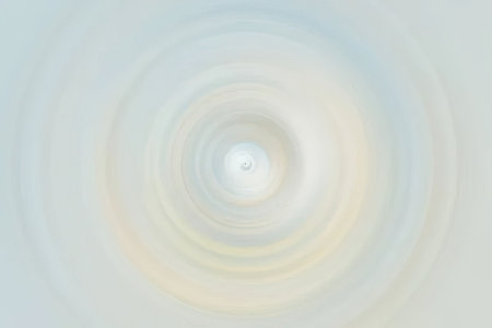Soft pastel colored ripples radiate from the center creating a calming visual effect with gentle...