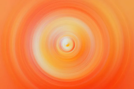Bright orange abstract background features swirling patterns and a central focal point creating a...