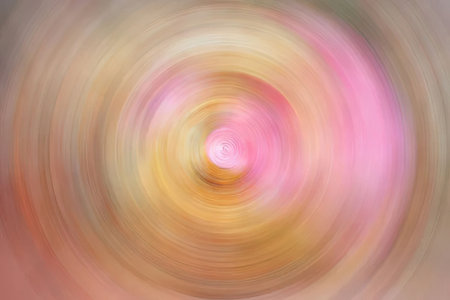 Soft pastel colors blend together in a swirling circular motion creating a calming visual effect...