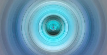 Vibrant blue and white concentric circles swirl together creating a hypnotic and abstract background...