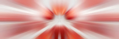 Radial motion blur creates dynamic visual movement with vibrant red and white hues, forming an abstract background that conveys energy and speed in a fluid, artistic design.の写真素材