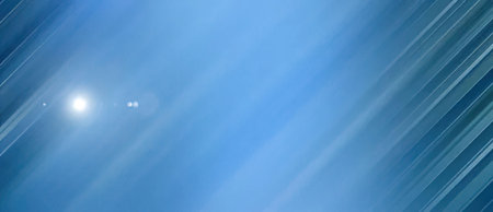 Bright light shines through a blue background with rays and shadows creating a serene and calm...