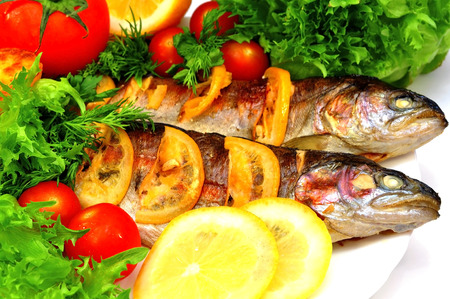 grilled trout with fresh herbsの写真素材