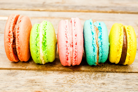 macaroon pastry set on a wooden tableの写真素材