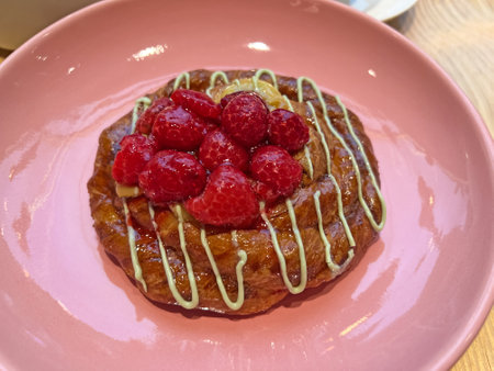 Bread with raspberries and cream for breakfast