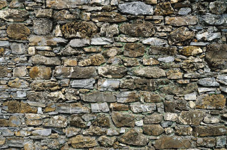 textured background old stone wallの写真素材