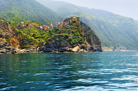 View from the Sea on beautiful Corniglia with Vineyardsの写真素材